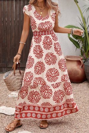 Vahna Smocked Waist Flutter Sleeve Maxi Dress